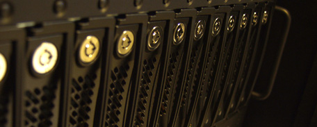 Photo close up of rack mounted removable hard drives.